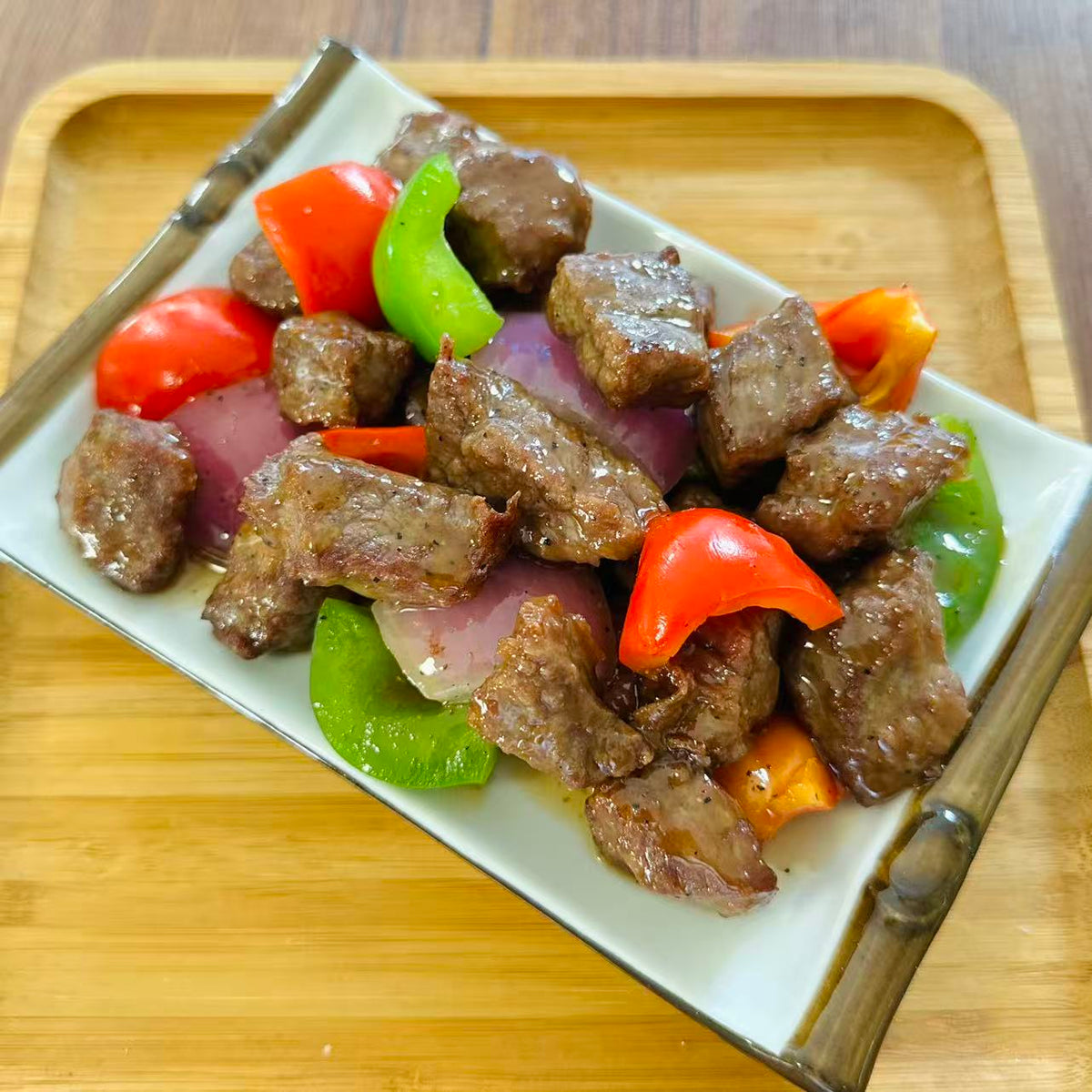 Black Pepper Beef in a 16 oz Family Meals container.