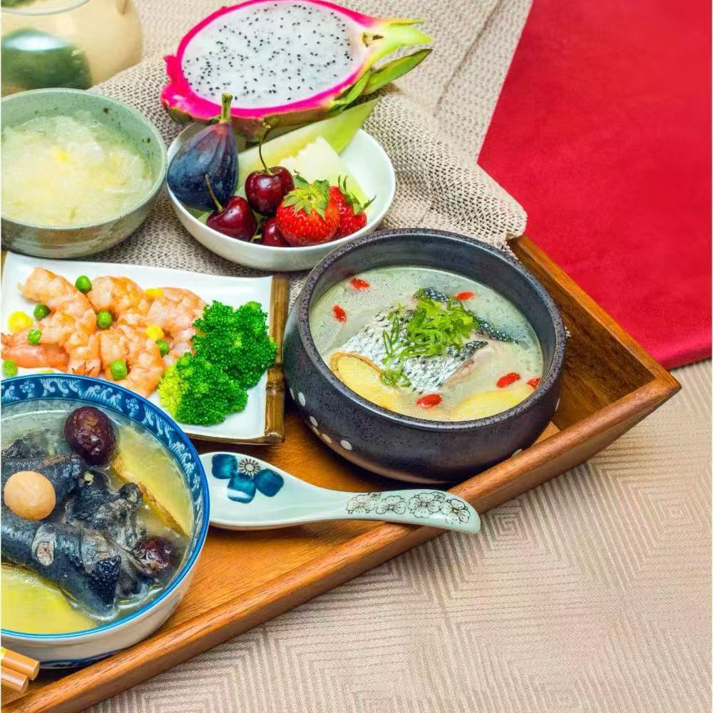 Breastfeeding meal with nourishing soup, protein, vegetables and fruit