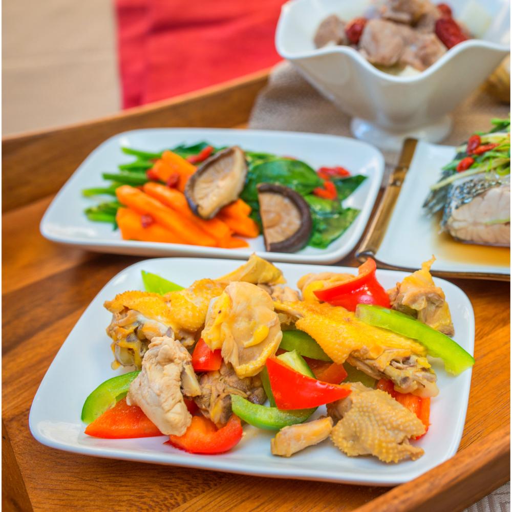 Chinese-inspired recovery meal with chicken, vegetables and steamed fish