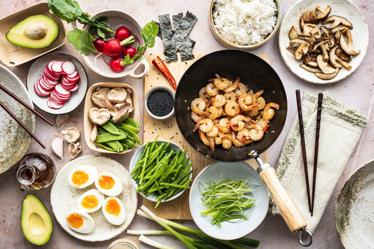 Chinese-inspired meal ingredients with shrimp, mushrooms, vegetables and rice