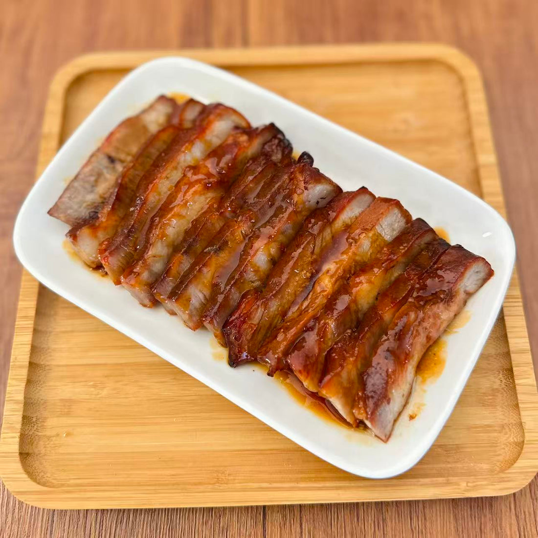 Cantonese BBQ Pork (Char Siu) in a 16 oz Family Meals container.