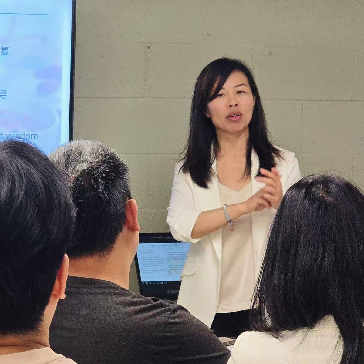 Lisa presenting a parent education workshop to a small group