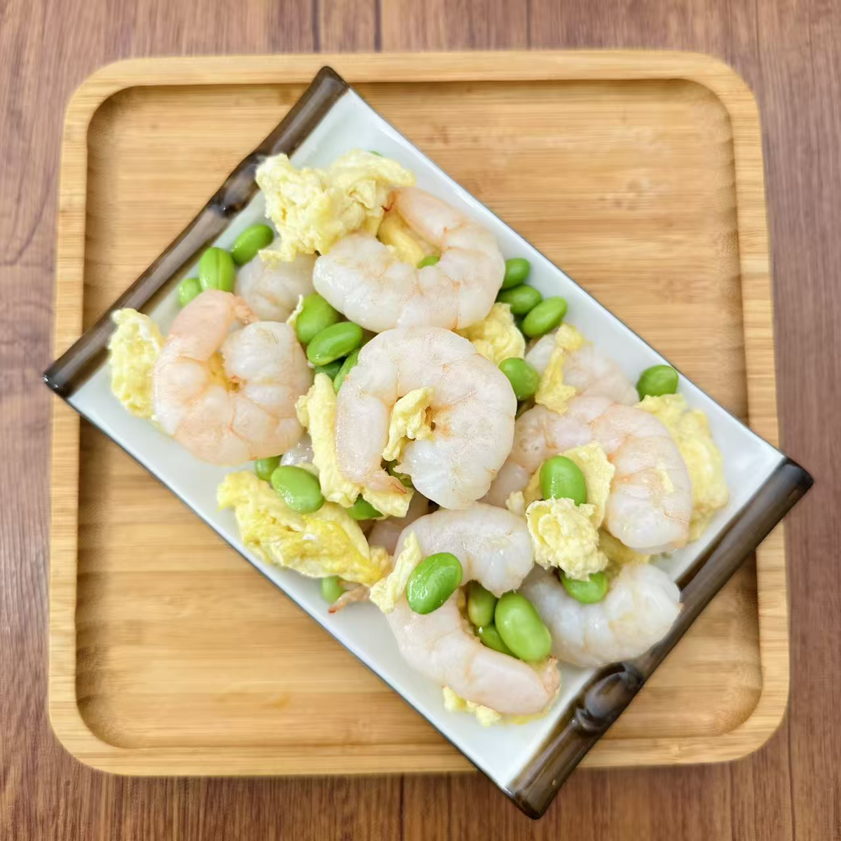 Shrimp with Egg &amp; Edamane in a 16 oz Family Meals container.